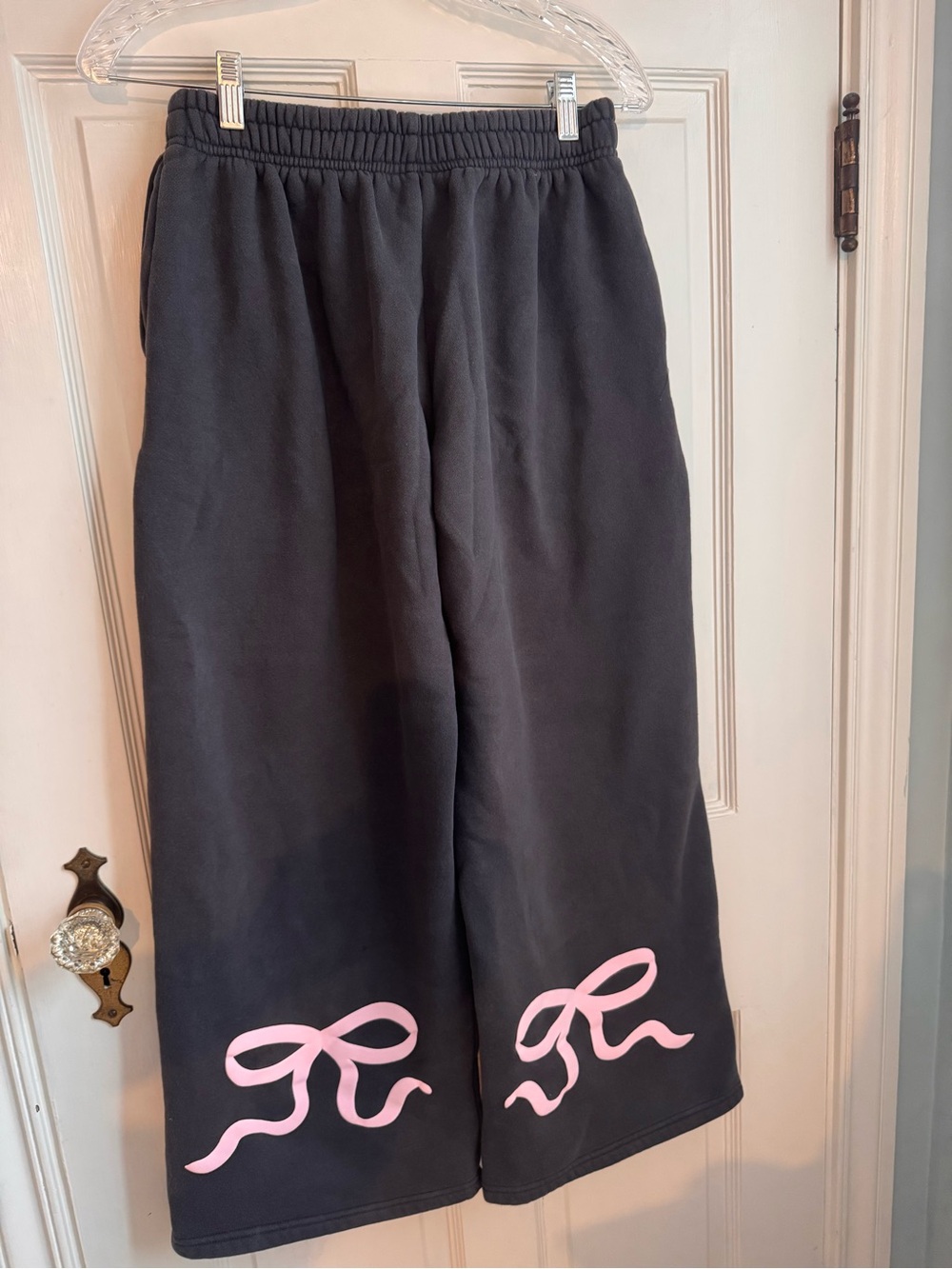 Edikted Black Wide-Leg Sweatpants with Pink Bow Detail